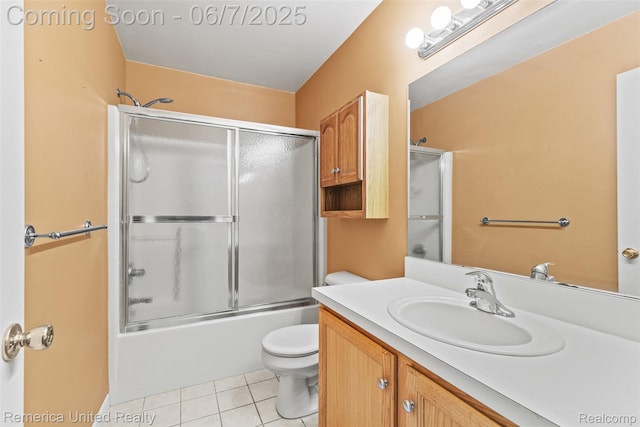 2663 Maple Forest Dr, Wixom, MI 48393 - bathroom with vanity, toilet, tile patterned floors, and shower / bath combination with glass door