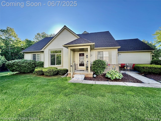 2663 Maple Forest Dr, Wixom, MI 48393 - view of front of house featuring a front lawn and roof with shingles