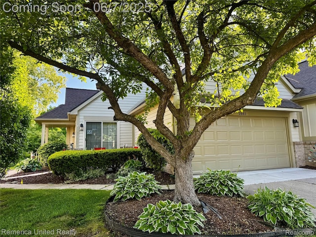 2663 Maple Forest Dr, Wixom, MI 48393 - obstructed view of property featuring a shingled roof, driveway, a garage, and brick siding