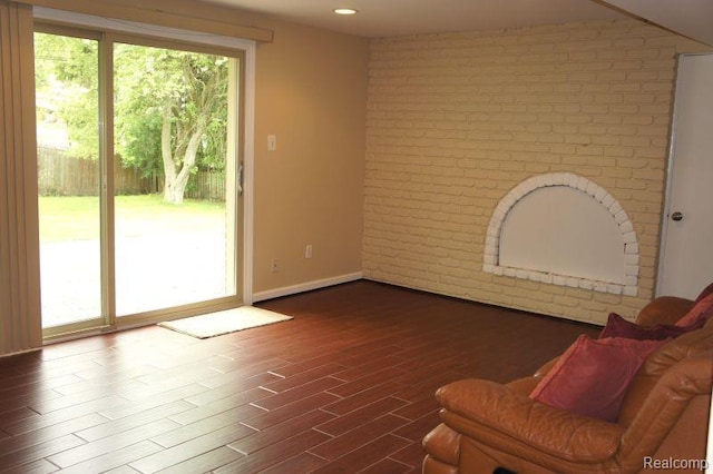 1616 Mark Hopkins Rd, Bloomfield Hills, MI 48302 - living area featuring brick wall, baseboards, dark wood-style floors, and recessed lighting