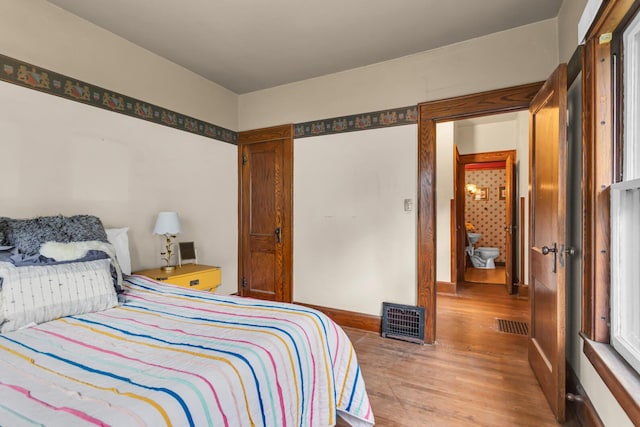810 N Superior St, Albion, MI 49224 - bedroom with wood finished floors