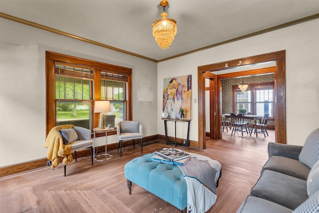 810 N Superior St, Albion, MI 49224 - living room with a chandelier, baseboards, and ornamental molding