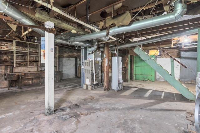 810 N Superior St, Albion, MI 49224 - unfinished below grade area featuring gas water heater and heating unit