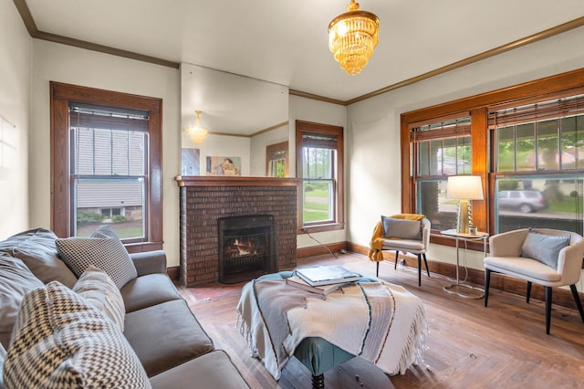 810 N Superior St, Albion, MI 49224 - living room with healthy amount of natural light, a chandelier, a brick fireplace, wood finished floors, and crown molding