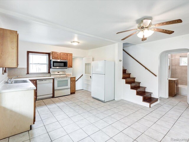 641 Michigan Ave, Marysville, MI 48040 - kitchen with white appliances, a sink, light countertops, and healthy amount of natural light