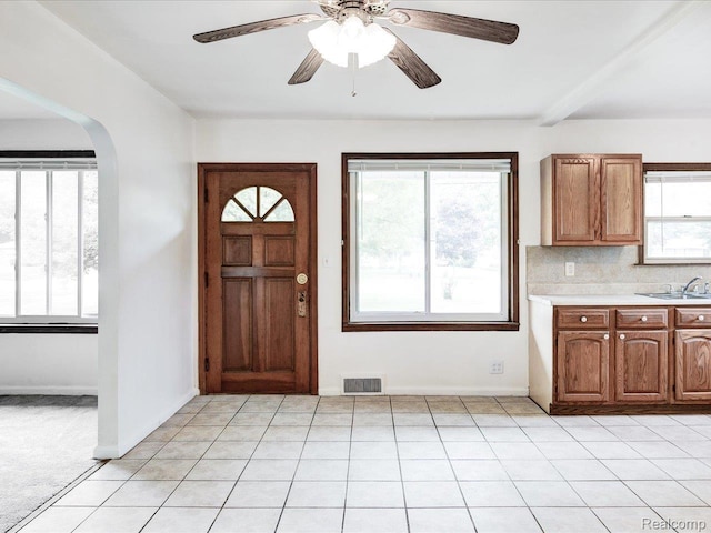 641 Michigan Ave, Marysville, MI 48040 - entrance foyer featuring arched walkways, ceiling fan, and baseboards