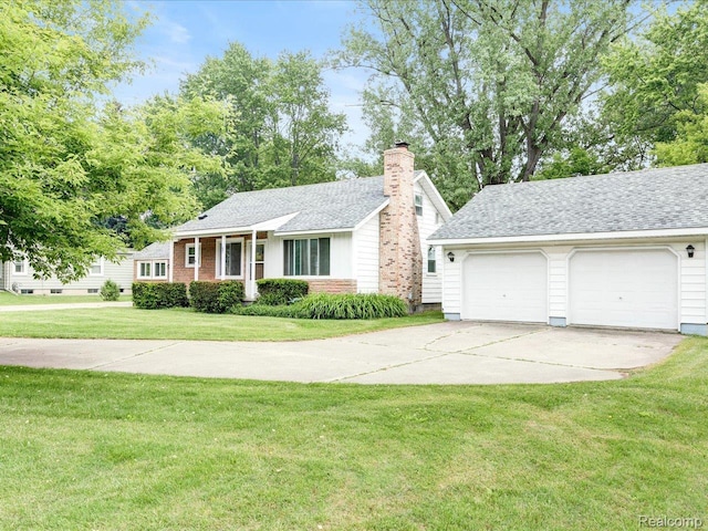 641 Michigan Ave, Marysville, MI 48040 - view of front of house featuring a garage, a front yard, a chimney, and a shingled roof