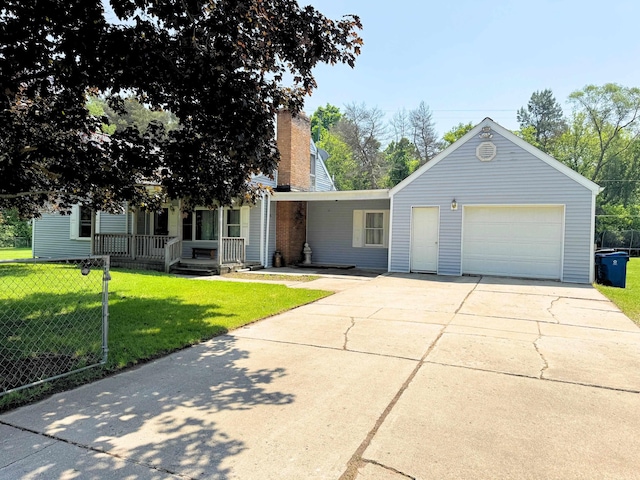 10073 Mcafee Dr, Montrose, MI 48457 - view of front of house with concrete driveway, a porch, a garage, and a chimney