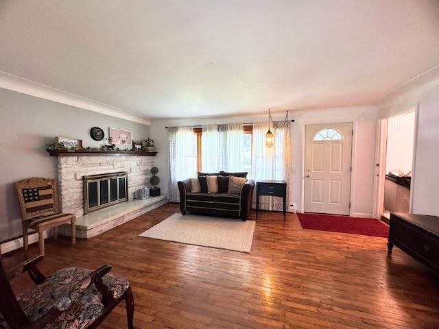 10073 Mcafee Dr, Montrose, MI 48457 - living area featuring hardwood / wood-style floors and a stone fireplace