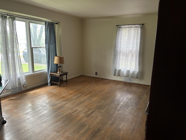 201 Goodell Ave, Colon, MI 49040 - empty room with hardwood / wood-style floors and baseboards