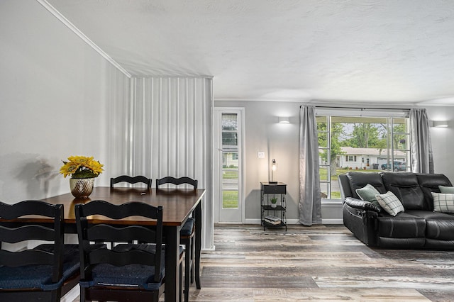 1012 E Hatch St, Sturgis, MI 49091 - dining room featuring wood finished floors and ornamental molding