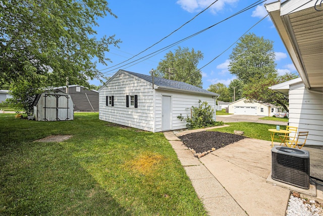 1012 E Hatch St, Sturgis, MI 49091 - view of green lawn featuring central air condition unit