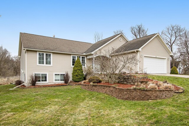 1200 Schuring Rd, Portage, MI 49024 - single story home with a garage, a front lawn, and driveway