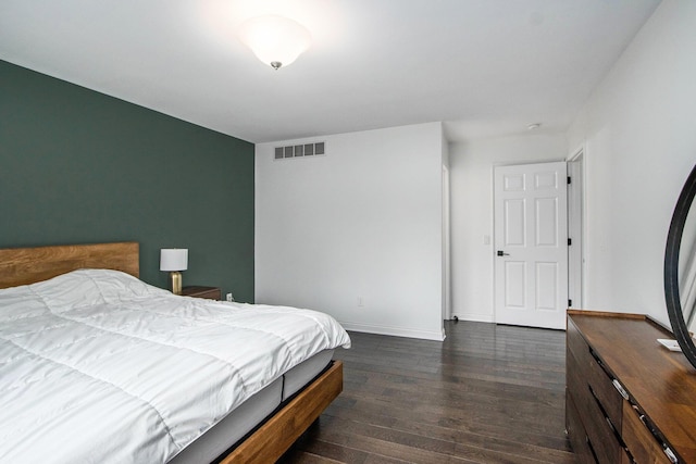1200 Schuring Rd, Portage, MI 49024 - bedroom with dark wood-type flooring and baseboards