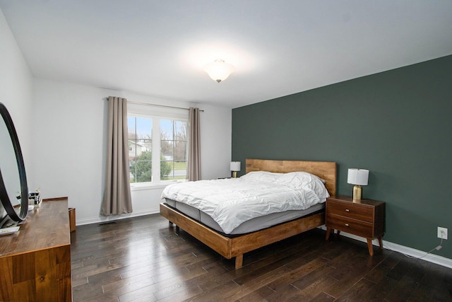 1200 Schuring Rd, Portage, MI 49024 - bedroom with dark wood finished floors and baseboards