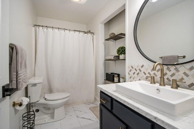 1200 Schuring Rd, Portage, MI 49024 - bathroom with toilet, vanity, marble look tiles, decorative backsplash, and curtained shower