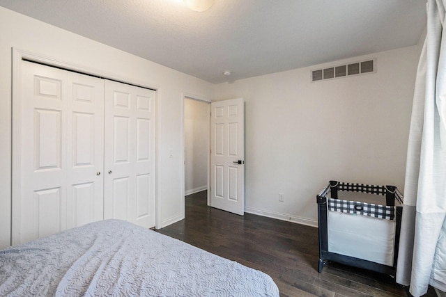 1200 Schuring Rd, Portage, MI 49024 - bedroom featuring dark wood-style floors, baseboards, and a closet