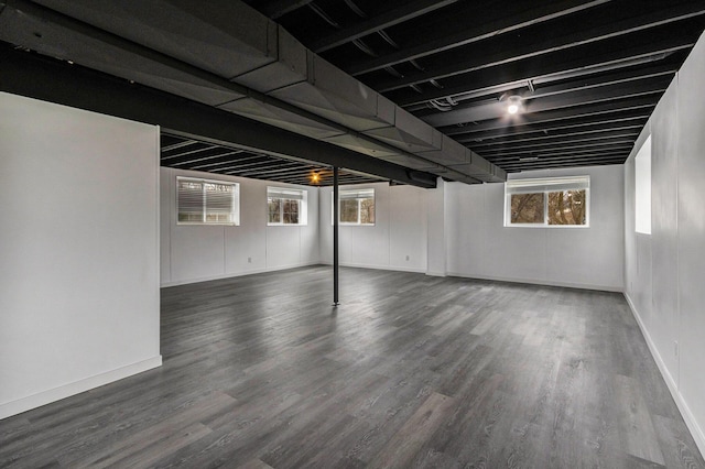 1200 Schuring Rd, Portage, MI 49024 - below grade area with wood finished floors, healthy amount of natural light, and baseboards