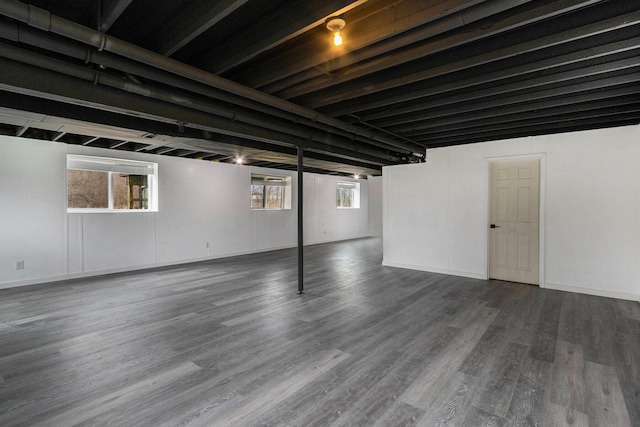 1200 Schuring Rd, Portage, MI 49024 - below grade area with wood finished floors and baseboards