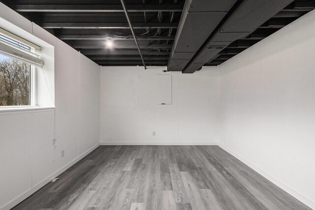 1200 Schuring Rd, Portage, MI 49024 - basement featuring wood finished floors and baseboards