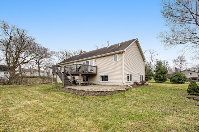 1200 Schuring Rd, Portage, MI 49024 - back of property with stairs, a wooden deck, a lawn, and a patio