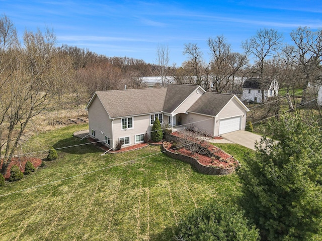 1200 Schuring Rd, Portage, MI 49024 - view of front of house with a garage, driveway, and a front yard