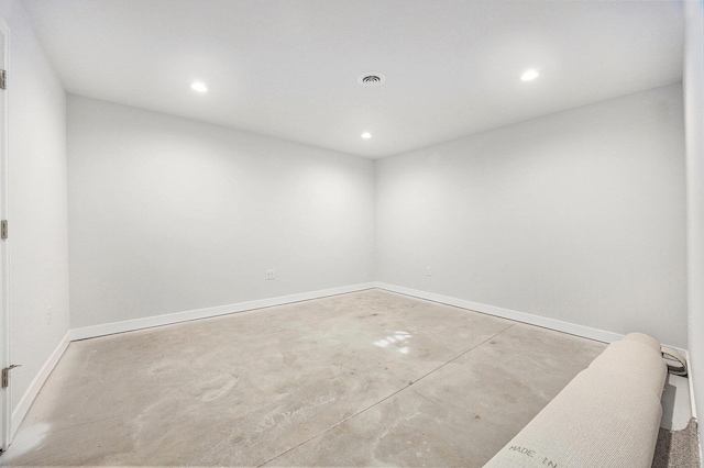 LOT166 Wren Ct, Caledonia, MI 49316 - spare room with concrete flooring, recessed lighting, and baseboards