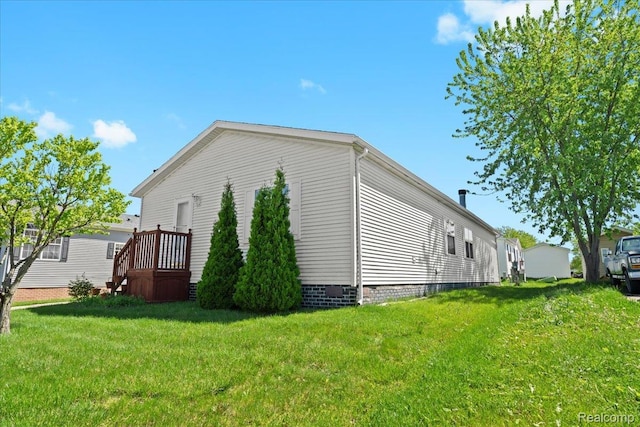 11091 Aspen Ct, South Lyon, MI 48178 - view of home's exterior with a lawn and crawl space
