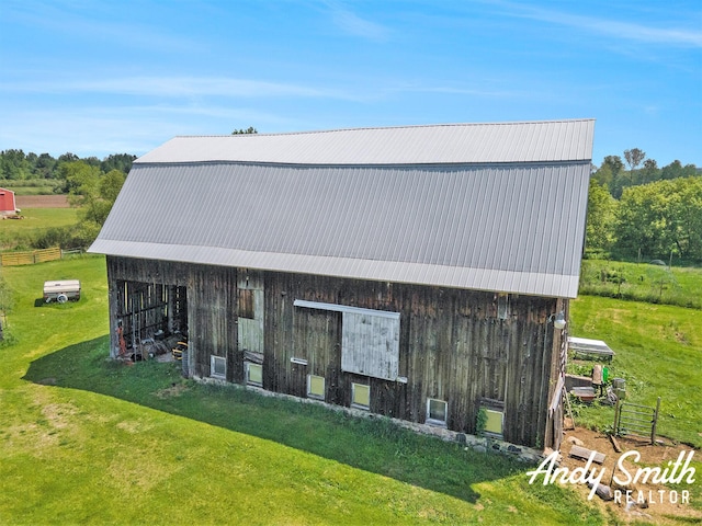 9386 N Vandecar Rd, Farwell, MI 48622 - view of barn with a yard