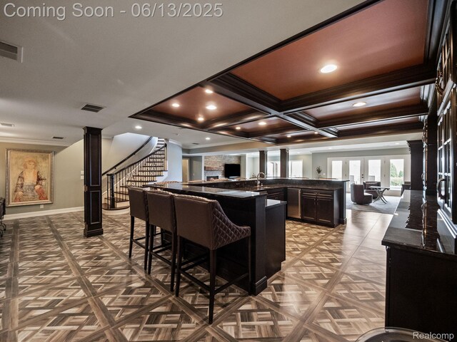 2750 Turtle Bluff Dr, Bloomfield Hills, MI 48302 - bar with decorative columns, stairs, ornamental molding, beam ceiling, and coffered ceiling