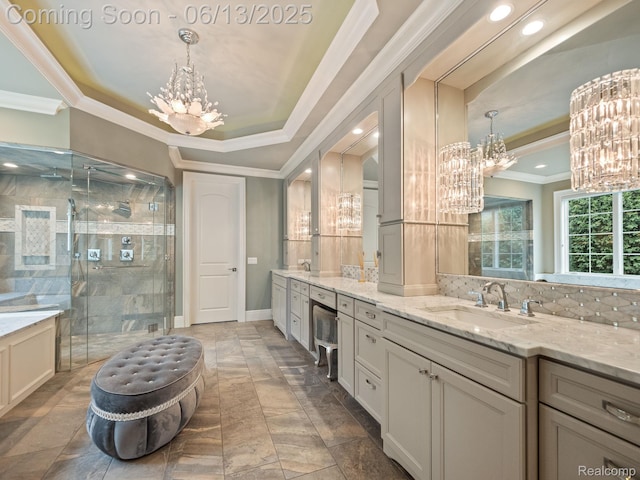2750 Turtle Bluff Dr, Bloomfield Hills, MI 48302 - full bathroom featuring a chandelier, double vanity, crown molding, a shower stall, and a raised ceiling