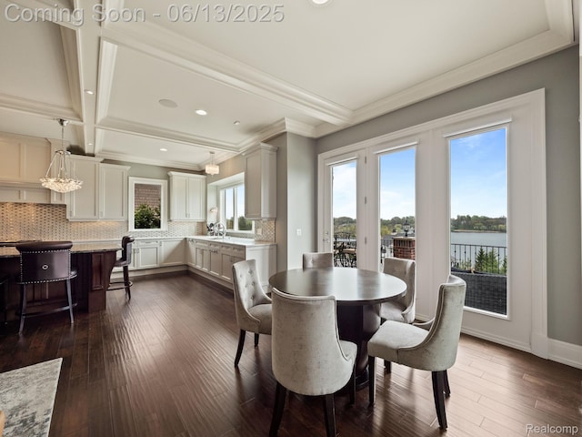 2750 Turtle Bluff Dr, Bloomfield Hills, MI 48302 - dining area with dark wood-type flooring, a water view, recessed lighting, and crown molding
