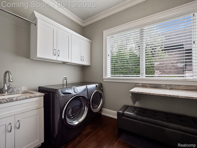 2750 Turtle Bluff Dr, Bloomfield Hills, MI 48302 - washroom with separate washer and dryer, crown molding, dark wood-type flooring, and cabinet space
