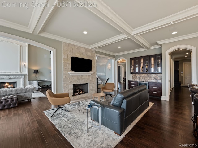 2750 Turtle Bluff Dr, Bloomfield Hills, MI 48302 - living room with a fireplace, arched walkways, a bar, beamed ceiling, and crown molding