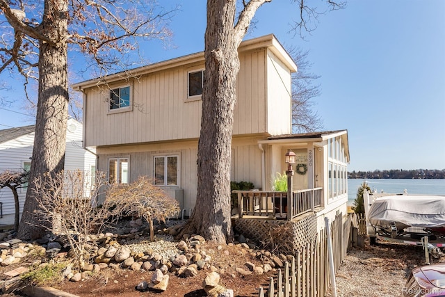 2830 N Duck Lake Rd, Highland, MI 48356 - view of front facade featuring a water view