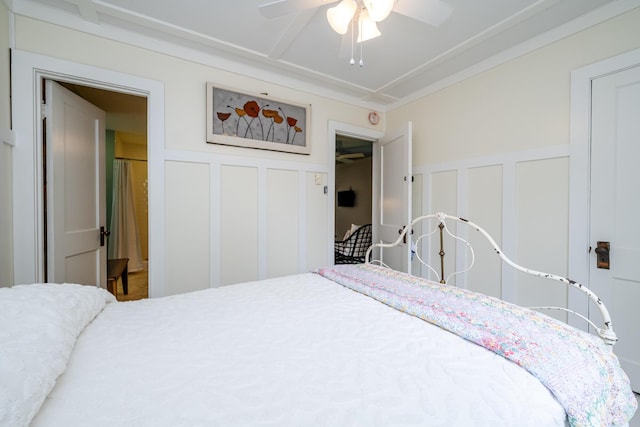 3619 Dearborn St, Coloma, MI 49038 - bedroom with a decorative wall, wainscoting, and a ceiling fan