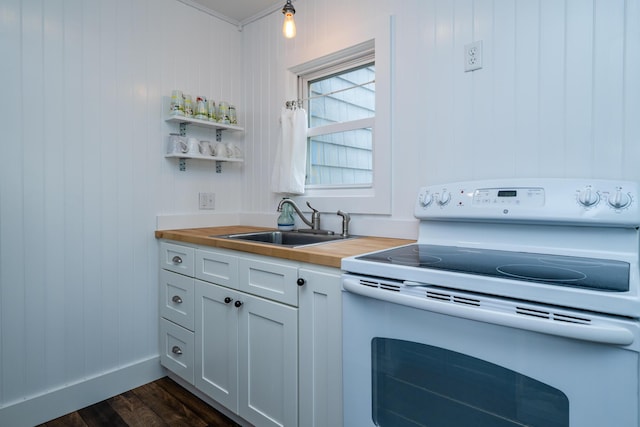 3619 Dearborn St, Coloma, MI 49038 - kitchen featuring white electric range, butcher block counters, a sink, dark wood finished floors, and open shelves