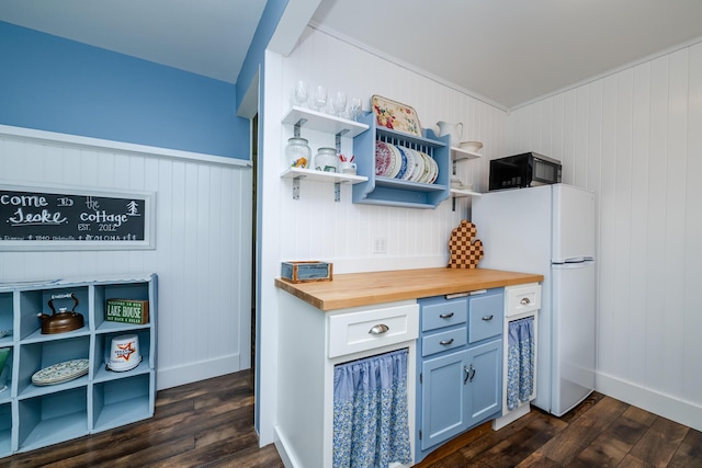 3619 Dearborn St, Coloma, MI 49038 - kitchen featuring freestanding refrigerator, wood counters, black microwave, dark wood-style flooring, and open shelves