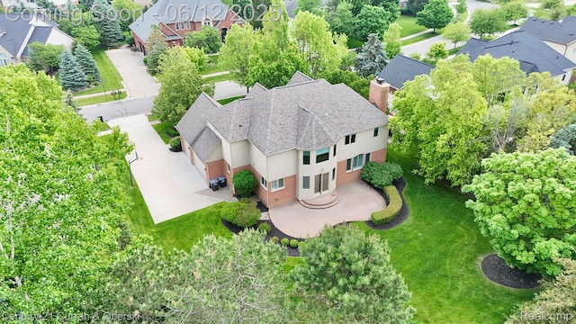 44251 Deep Hollow Cir, Northville, MI 48168 - aerial view of residential area with a tree filled landscape