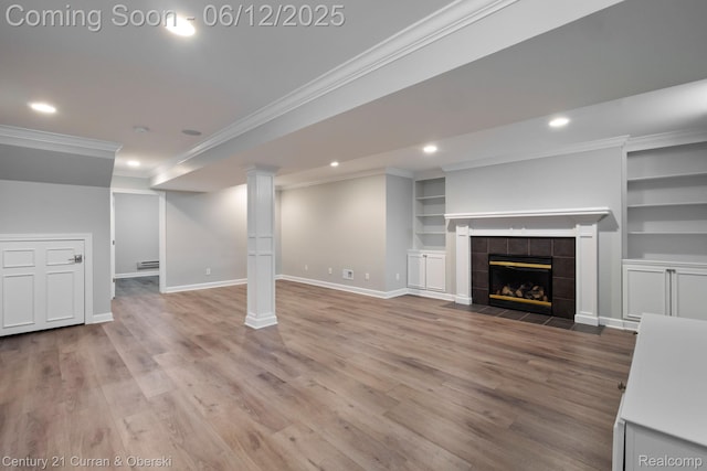 44251 Deep Hollow Cir, Northville, MI 48168 - unfurnished living room with recessed lighting, baseboards, crown molding, built in features, and wood finished floors