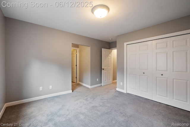 44251 Deep Hollow Cir, Northville, MI 48168 - unfurnished bedroom with carpet flooring, baseboards, and a closet