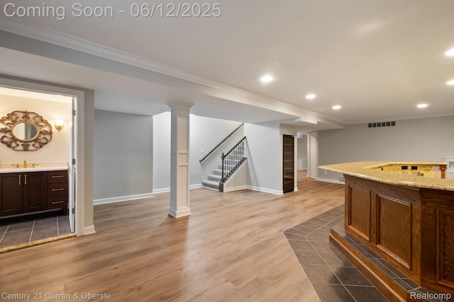 44251 Deep Hollow Cir, Northville, MI 48168 - bar featuring crown molding, recessed lighting, stairway, wood finished floors, and baseboards