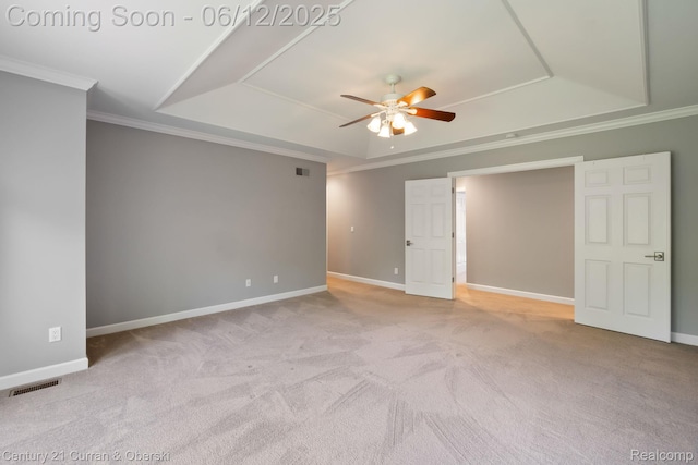 44251 Deep Hollow Cir, Northville, MI 48168 - carpeted spare room featuring a raised ceiling, a ceiling fan, crown molding, and baseboards
