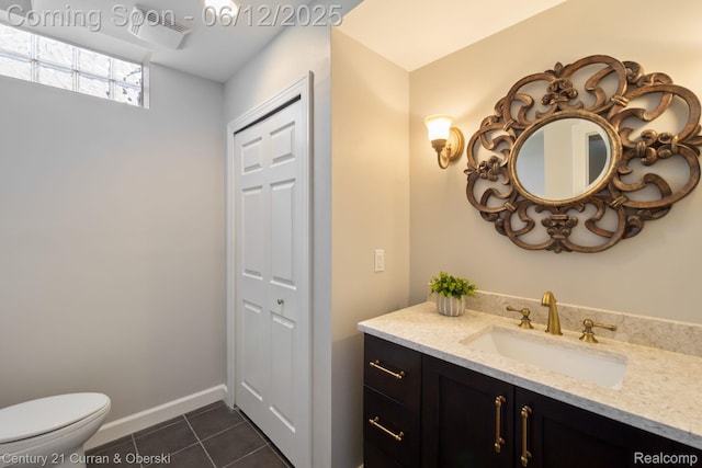 44251 Deep Hollow Cir, Northville, MI 48168 - bathroom featuring tile patterned floors, vanity, toilet, and baseboards