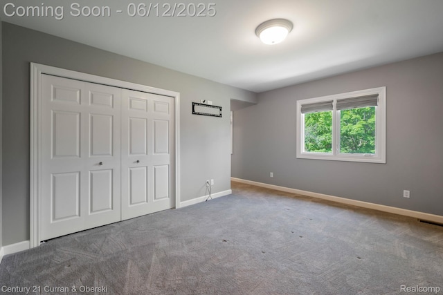 44251 Deep Hollow Cir, Northville, MI 48168 - unfurnished bedroom featuring carpet flooring, baseboards, and a closet