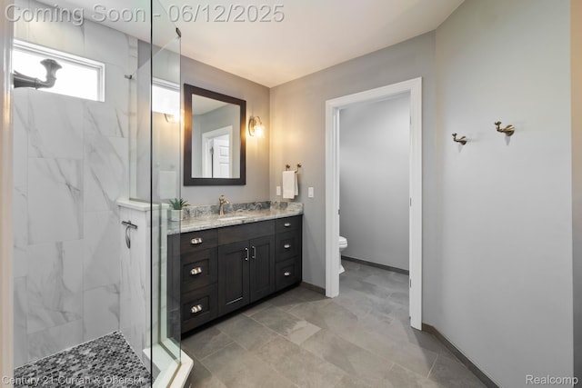 44251 Deep Hollow Cir, Northville, MI 48168 - bathroom featuring toilet, a marble finish shower, vanity, and baseboards