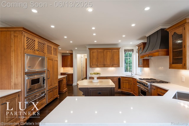 2937 Turtle Pond Ct, Bloomfield Hills, MI 48302 - kitchen with high end stainless steel range oven, custom range hood, light countertops, crown molding, and recessed lighting