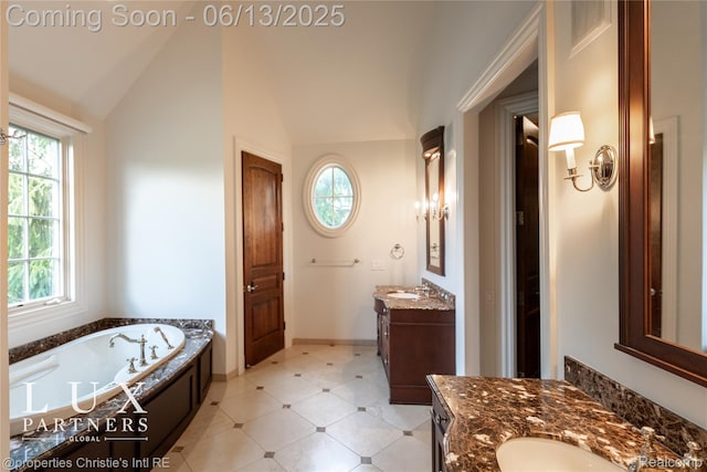 2937 Turtle Pond Ct, Bloomfield Hills, MI 48302 - bathroom featuring vaulted ceiling, healthy amount of natural light, two vanities, a bath, and tile patterned floors