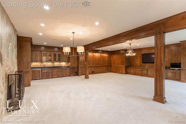 2937 Turtle Pond Ct, Bloomfield Hills, MI 48302 - unfurnished living room featuring a chandelier, light carpet, wood walls, and recessed lighting
