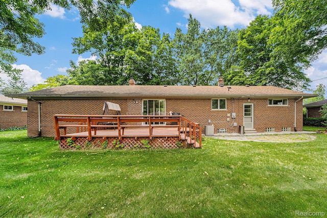 30060 Eastfield St, Farmington Hills, MI 48334 - back of property featuring brick siding, a chimney, and a lawn